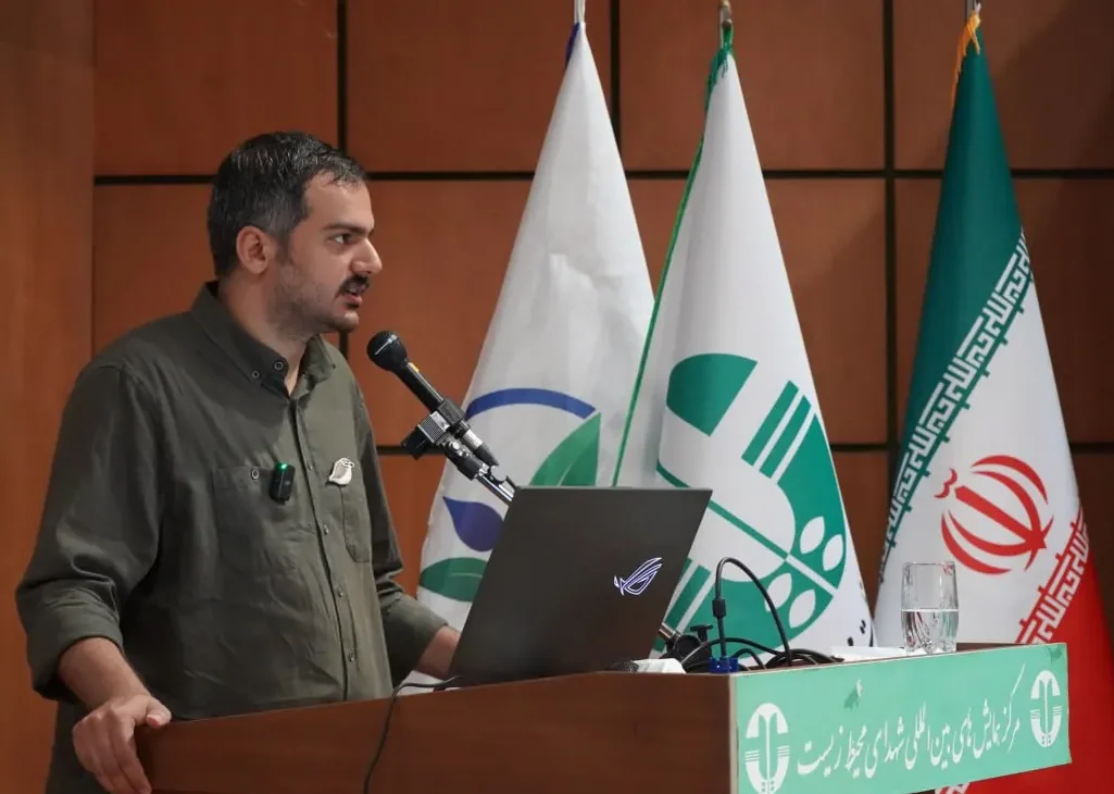 Iman Ebrahimi introducing the Homa Environmental Grant to participants at the 2025 Youth and Environment Conference in Iran.”